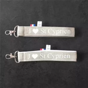 ¨Porte clé toile du soleil avec impression St Cyprien en blanc